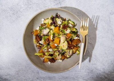 Shaved Brussels Sprouts with Roasted Beets, Pecans and Goat Cheese