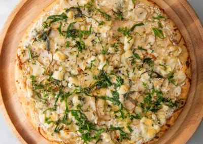 Jerusalem Artichoke Pizza with Kale and Bleu Cheese